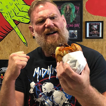 Josh Barnett about to punch a burger.